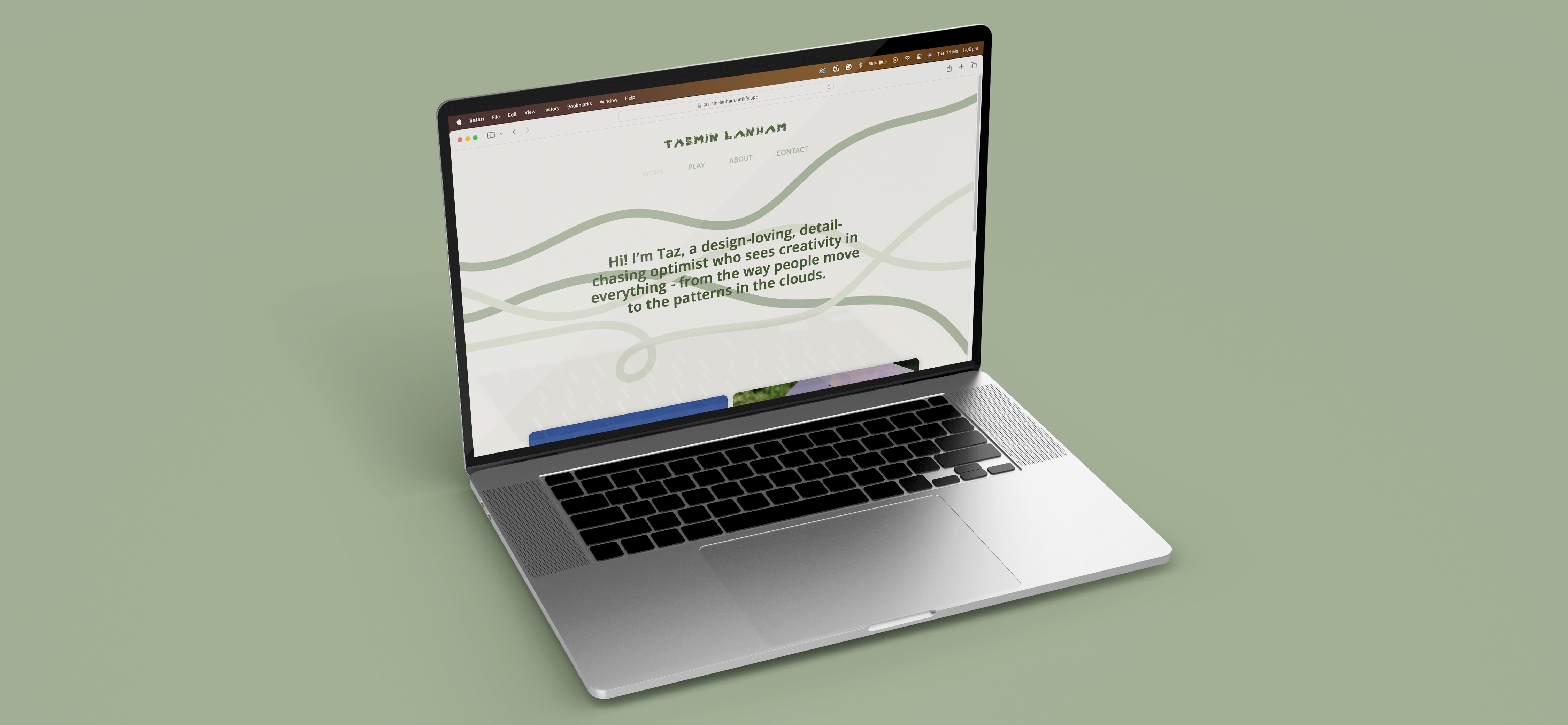 Image of a laptop with my website on the screen