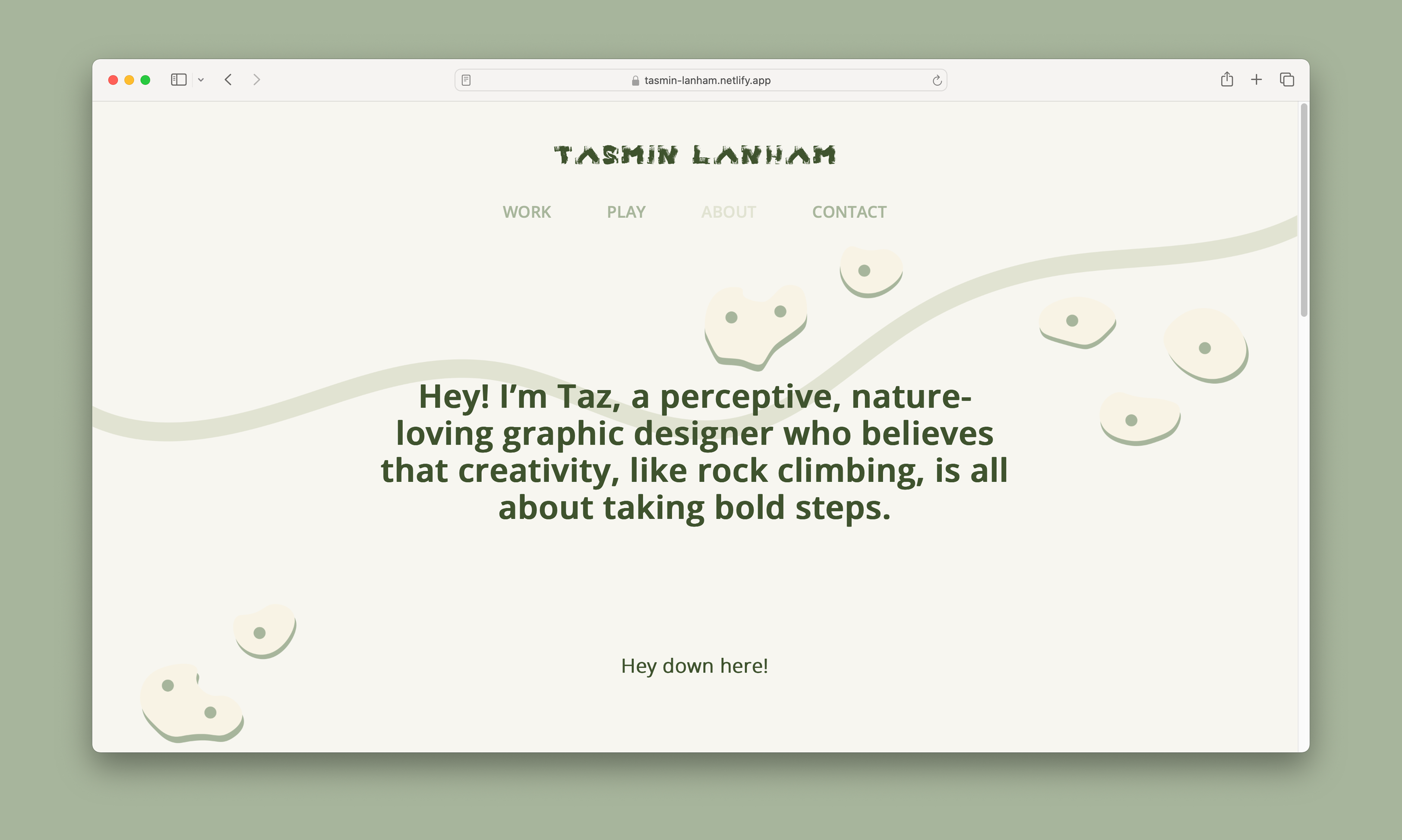 Image of a laptop with my website and code on the screen